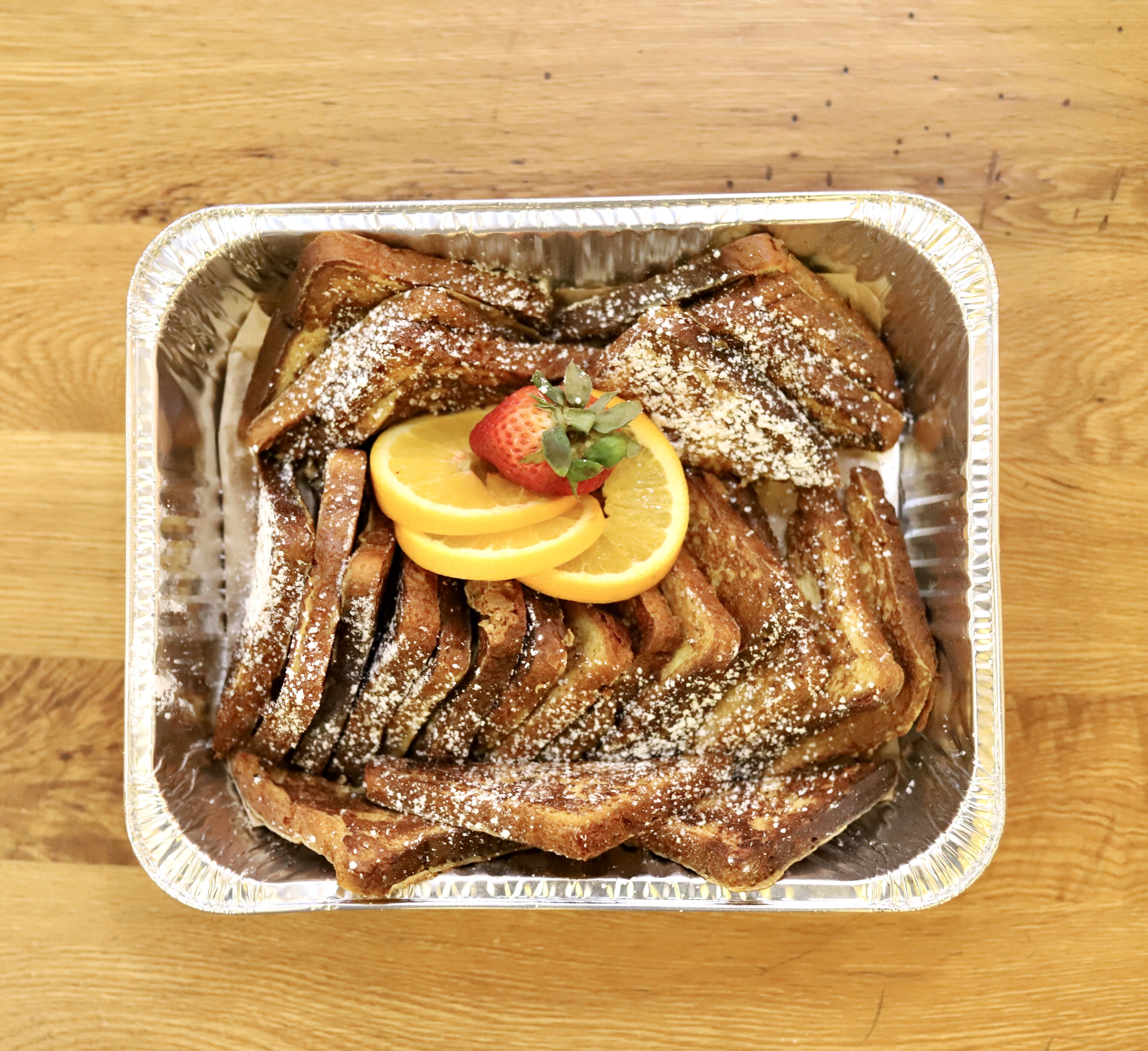 Brioche French Toast with Butter and Maple Syrup